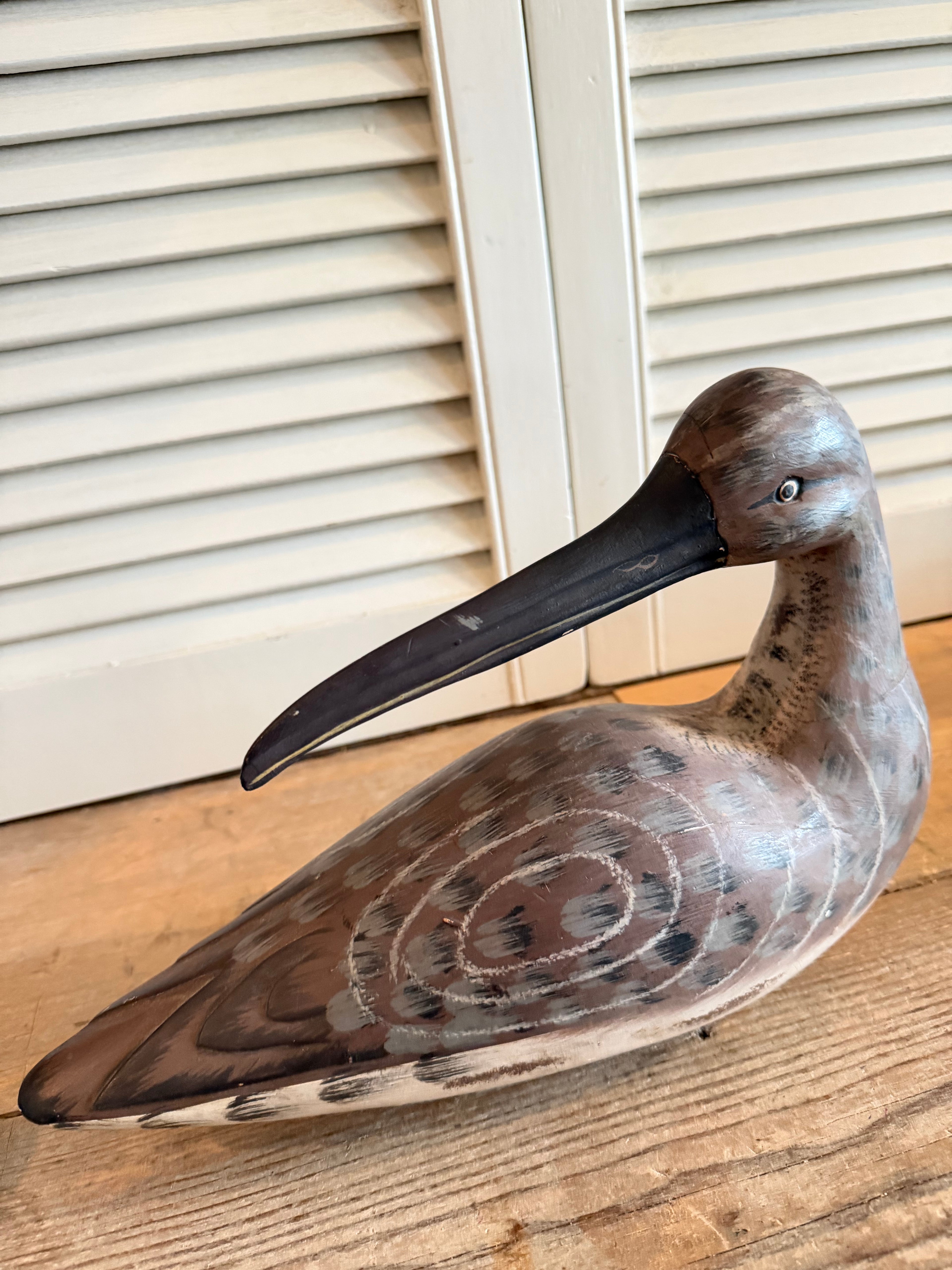 Handbeschilderde houten wulp - decoratieve lokvogel