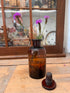 Vintage apothekersflesje met formule