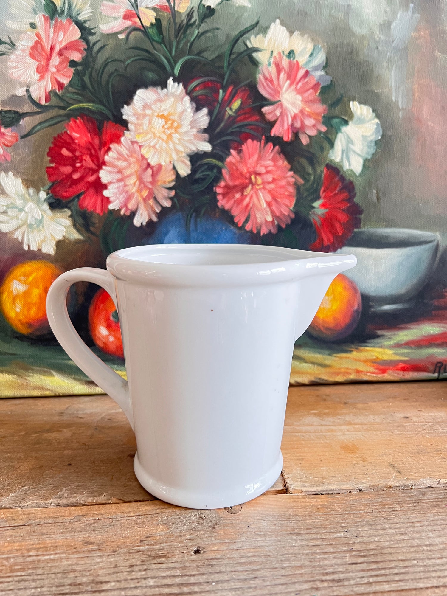 maatbeker pint porselein, witte maatbeker porselein, porseleinen maatbeker, maatbeker 500 ml, stijlvolle maatbeker, keukenmaatbeker porselein, keukenaccessoire wit, precisie maatbeker porselein.