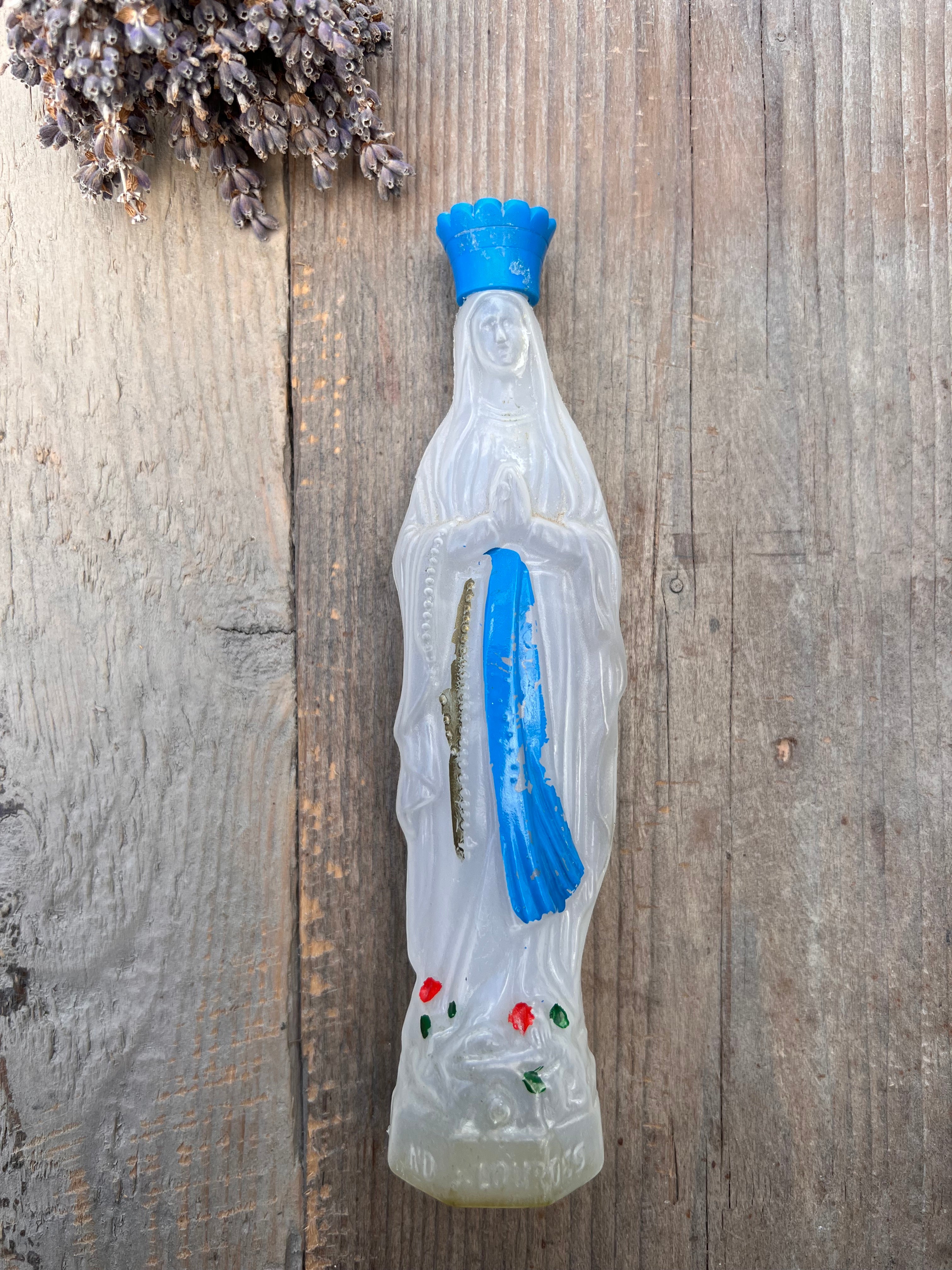 Empty holy water bottle Maria de Lourdes