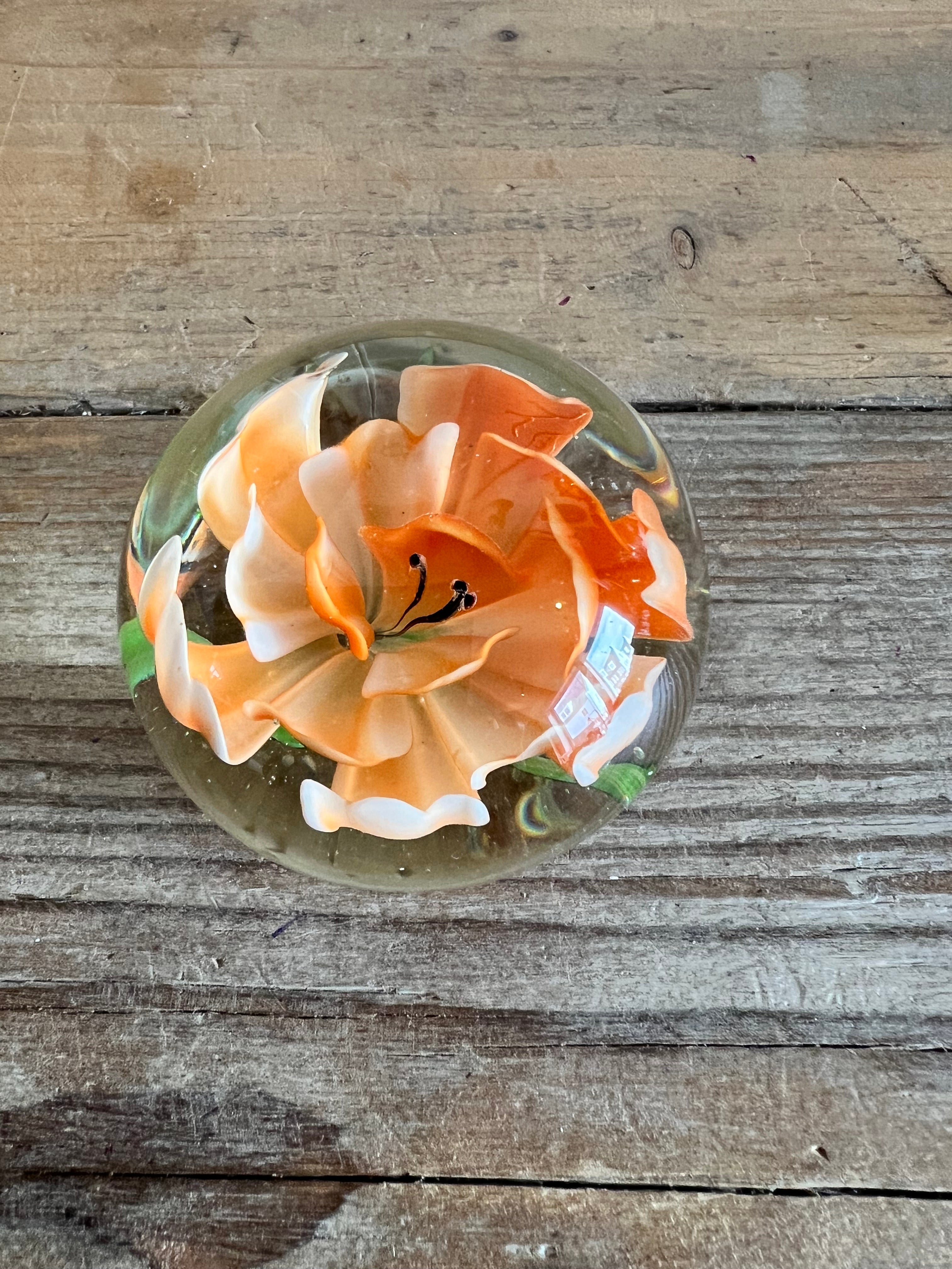 Presse papier oranje bloem