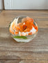 Presse papier oranje bloem