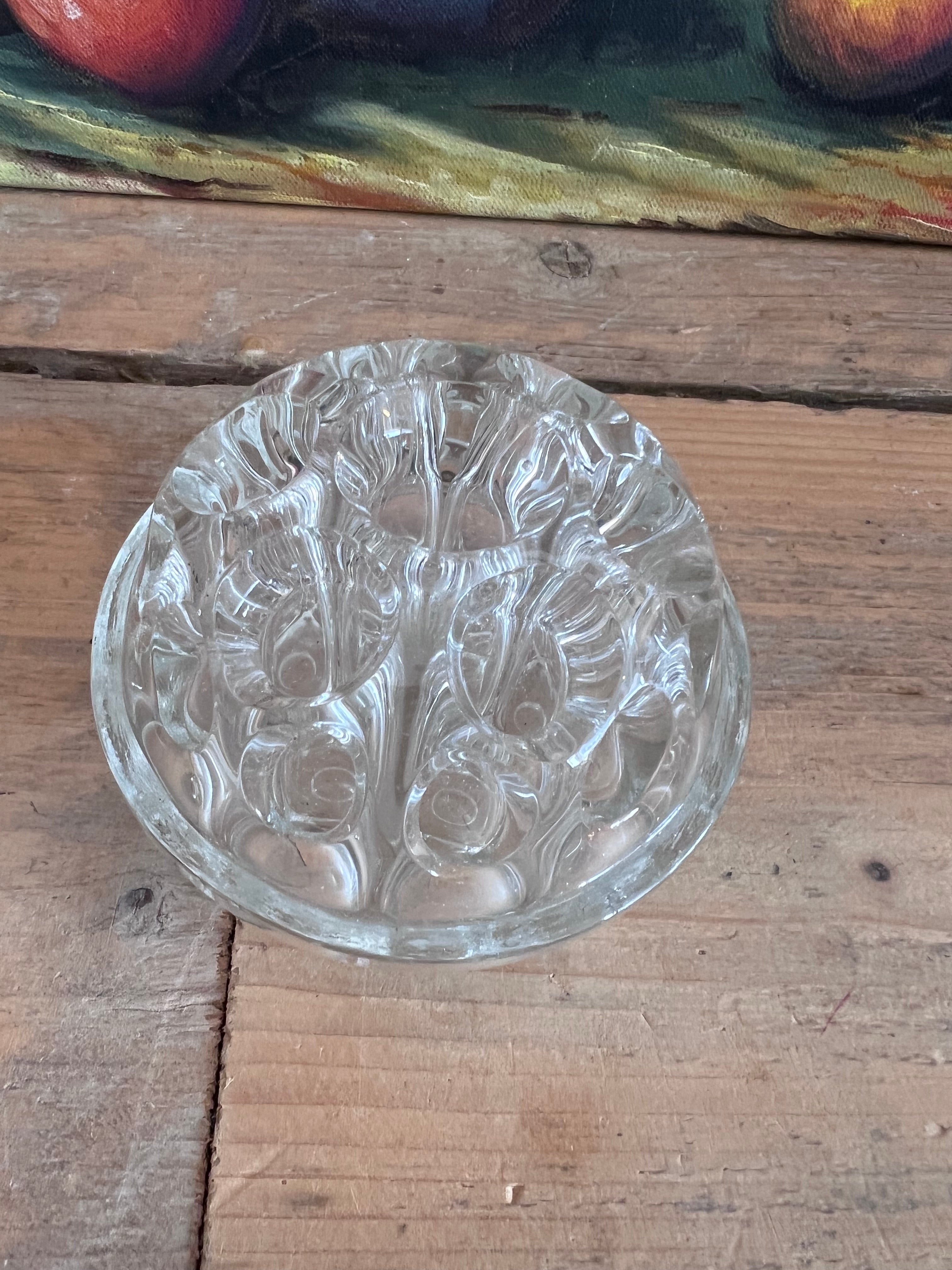 Pique fleurs van glas