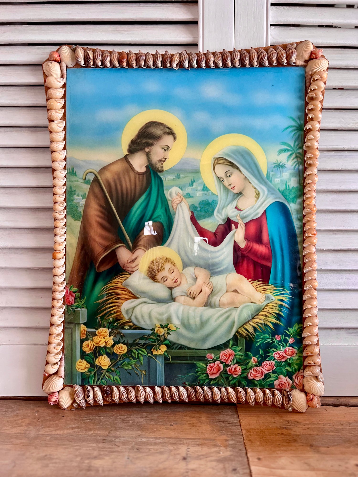 Heilige familie muurdecoratie met schelpen