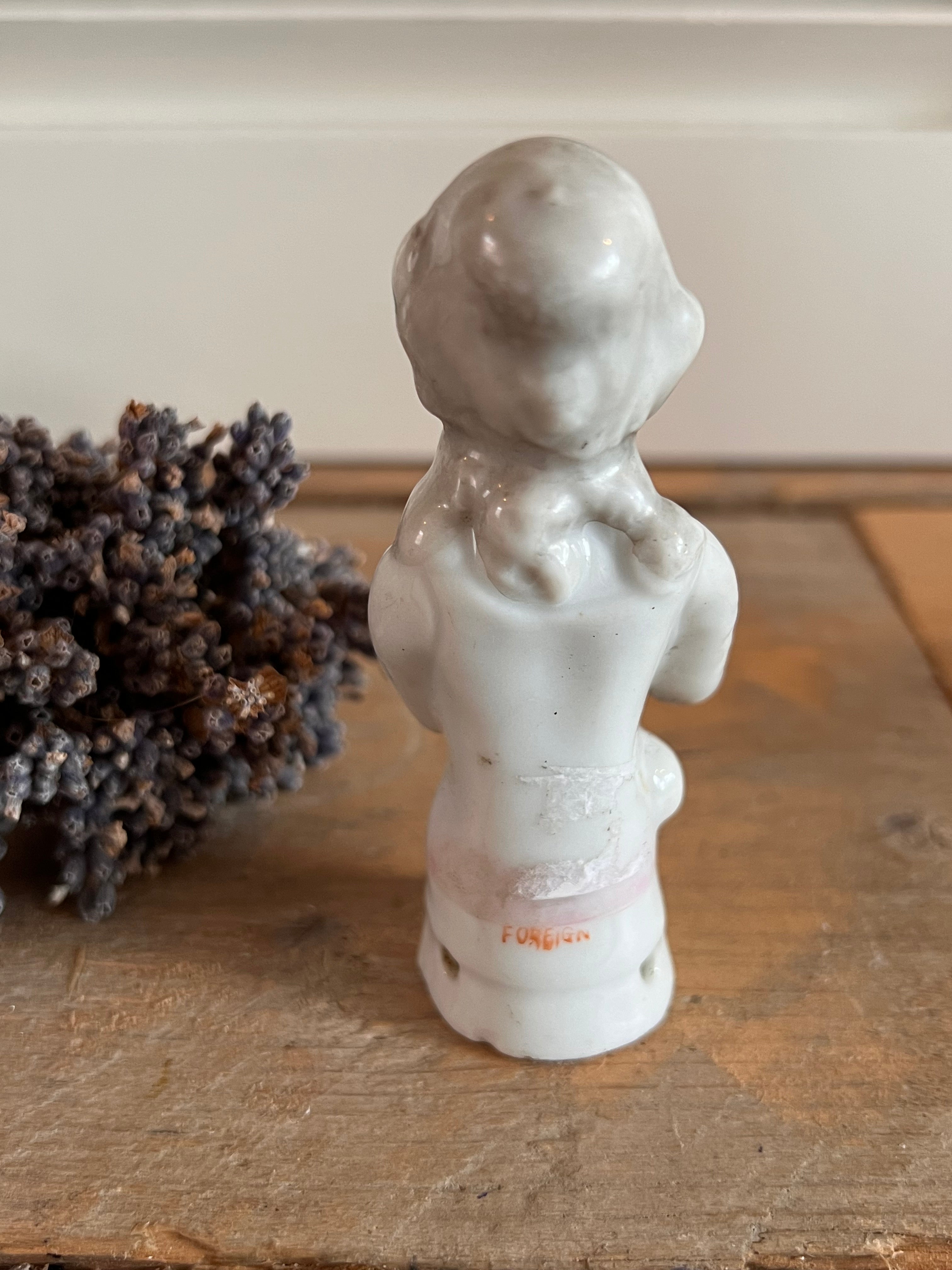 Antieke half doll