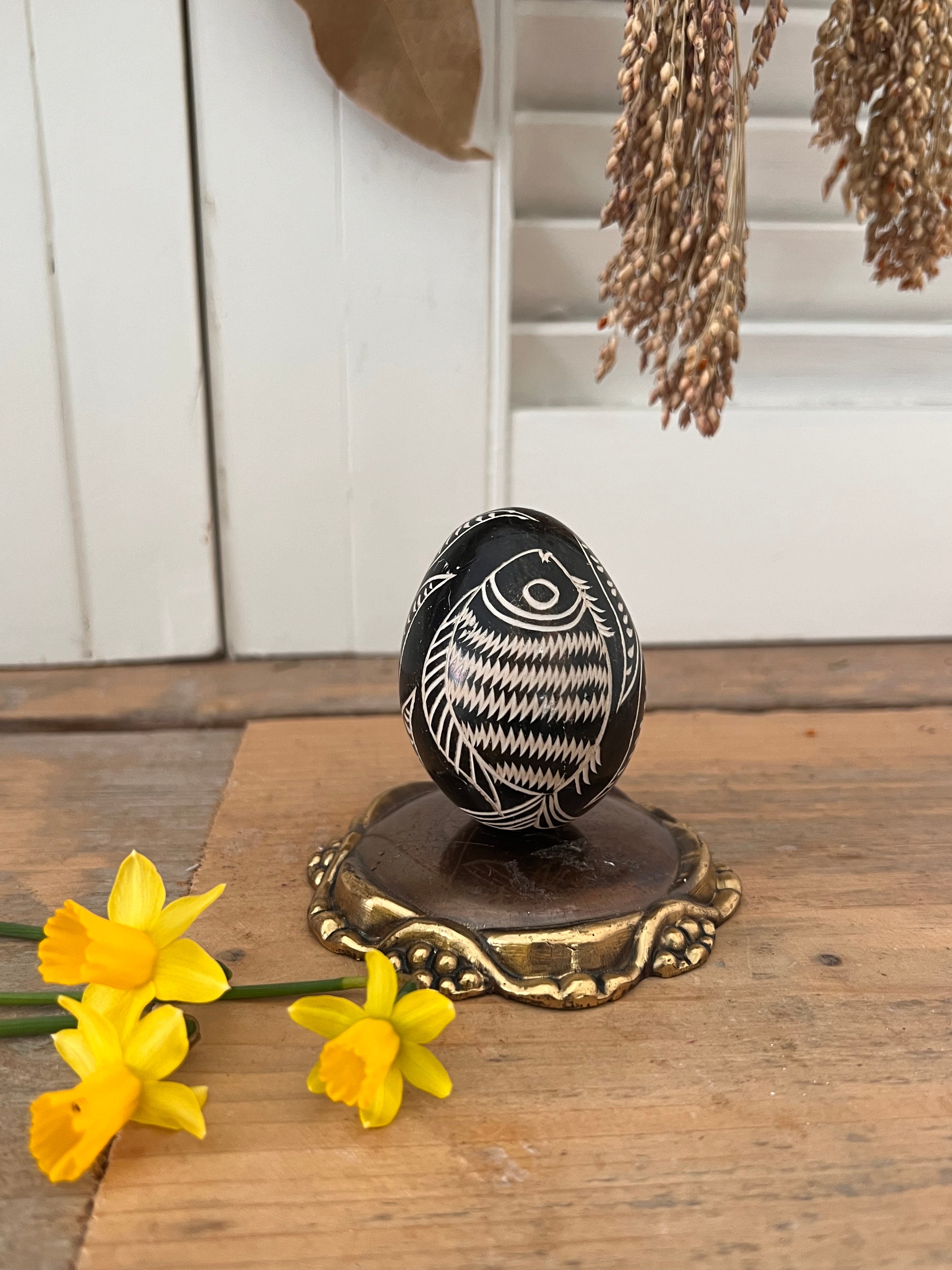 Brown egg with fish