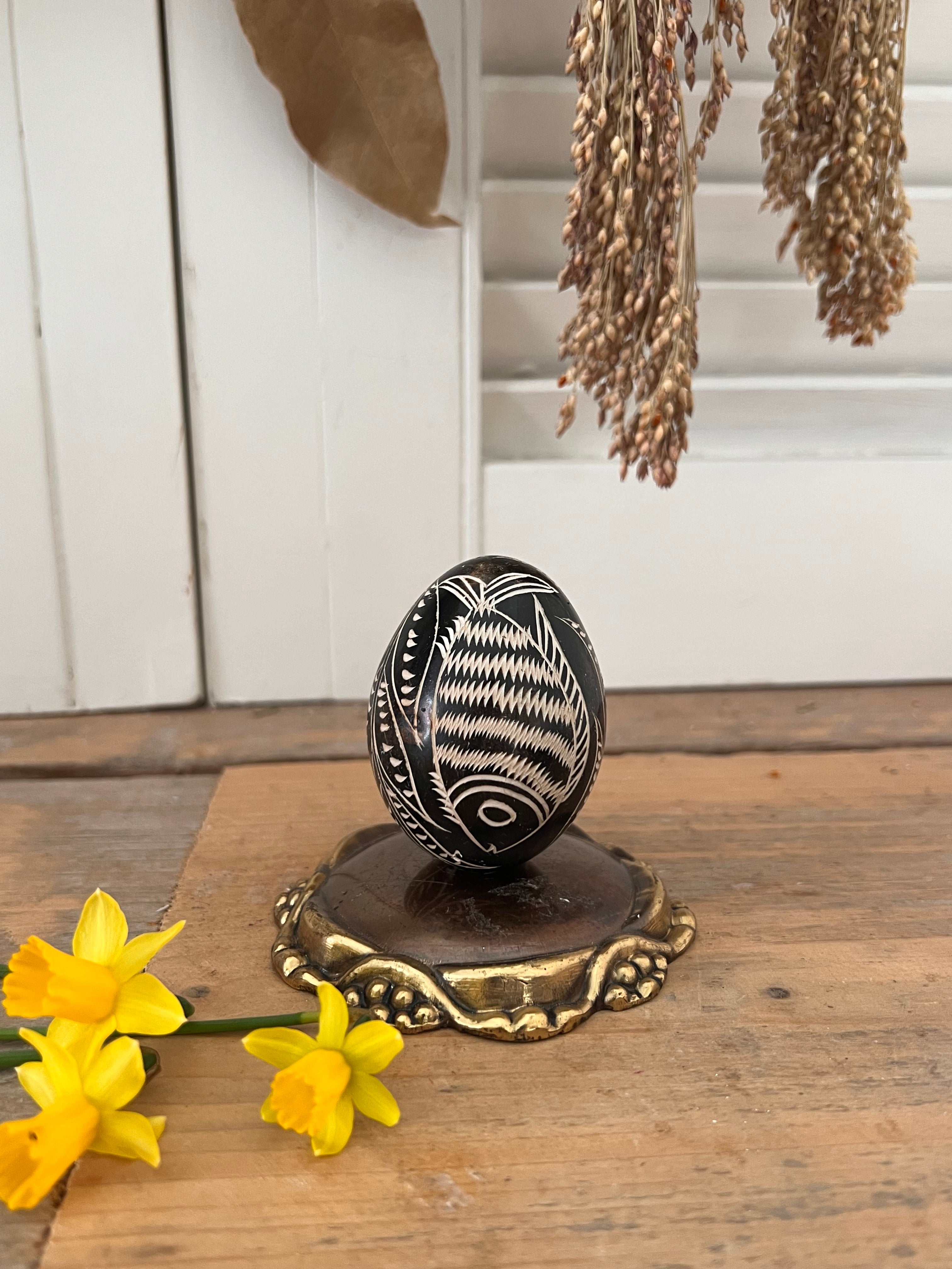 Brown egg with fish