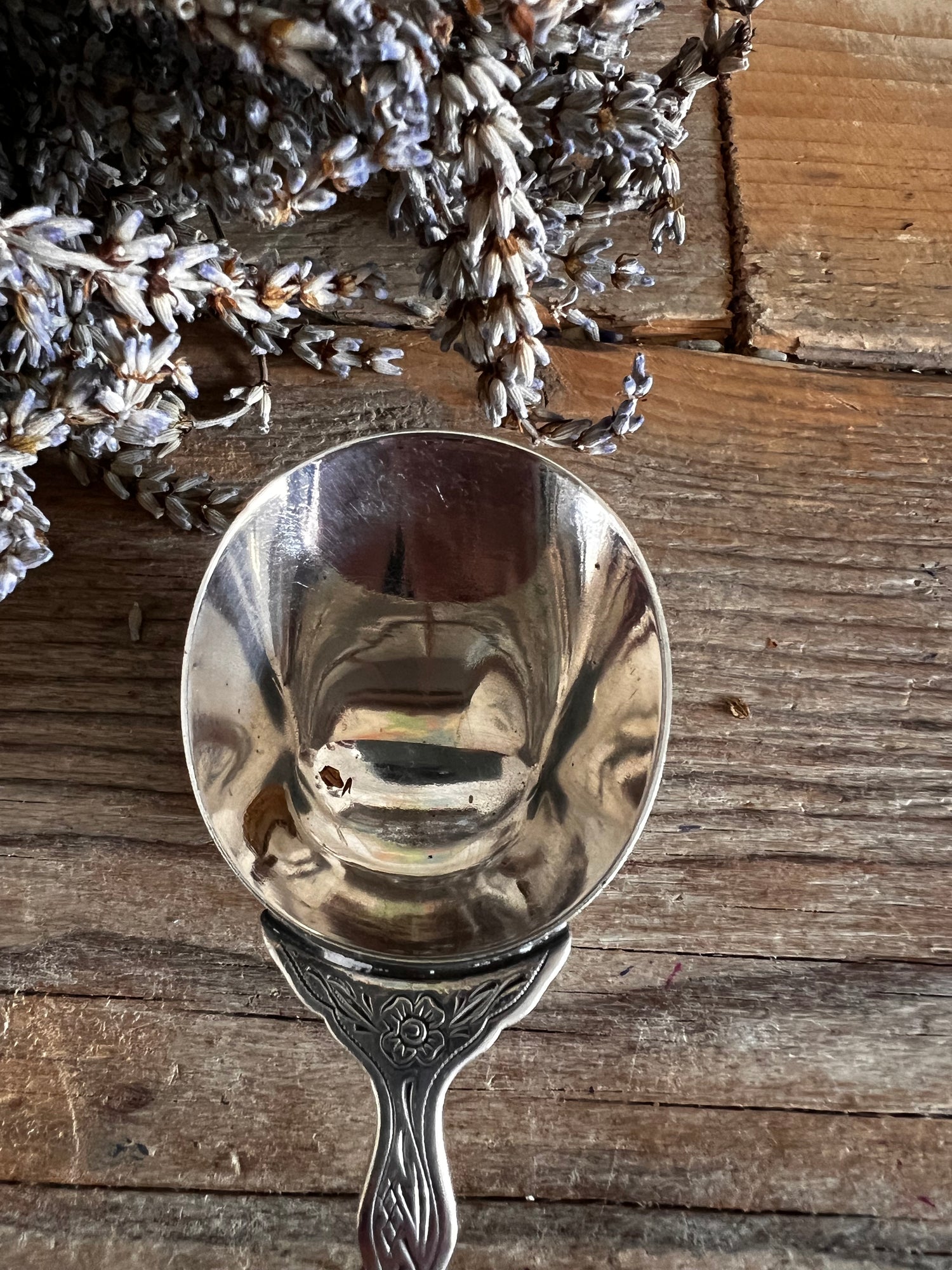 Verzilverde koffieschep Douwe Egberts