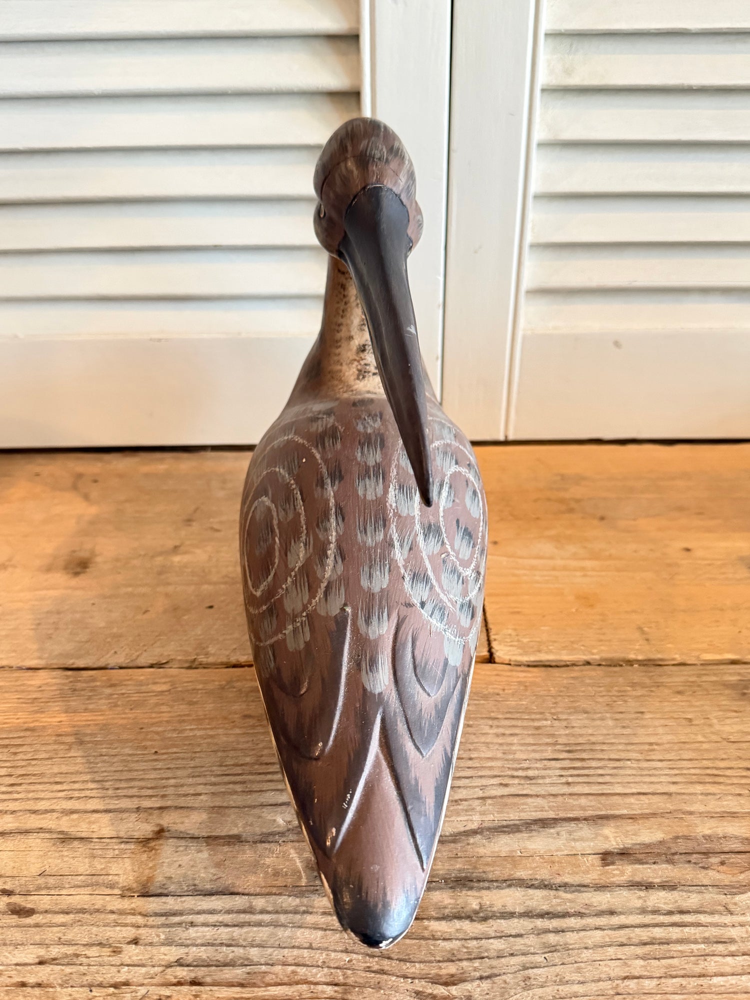 Handbeschilderde houten wulp - decoratieve lokvogel
