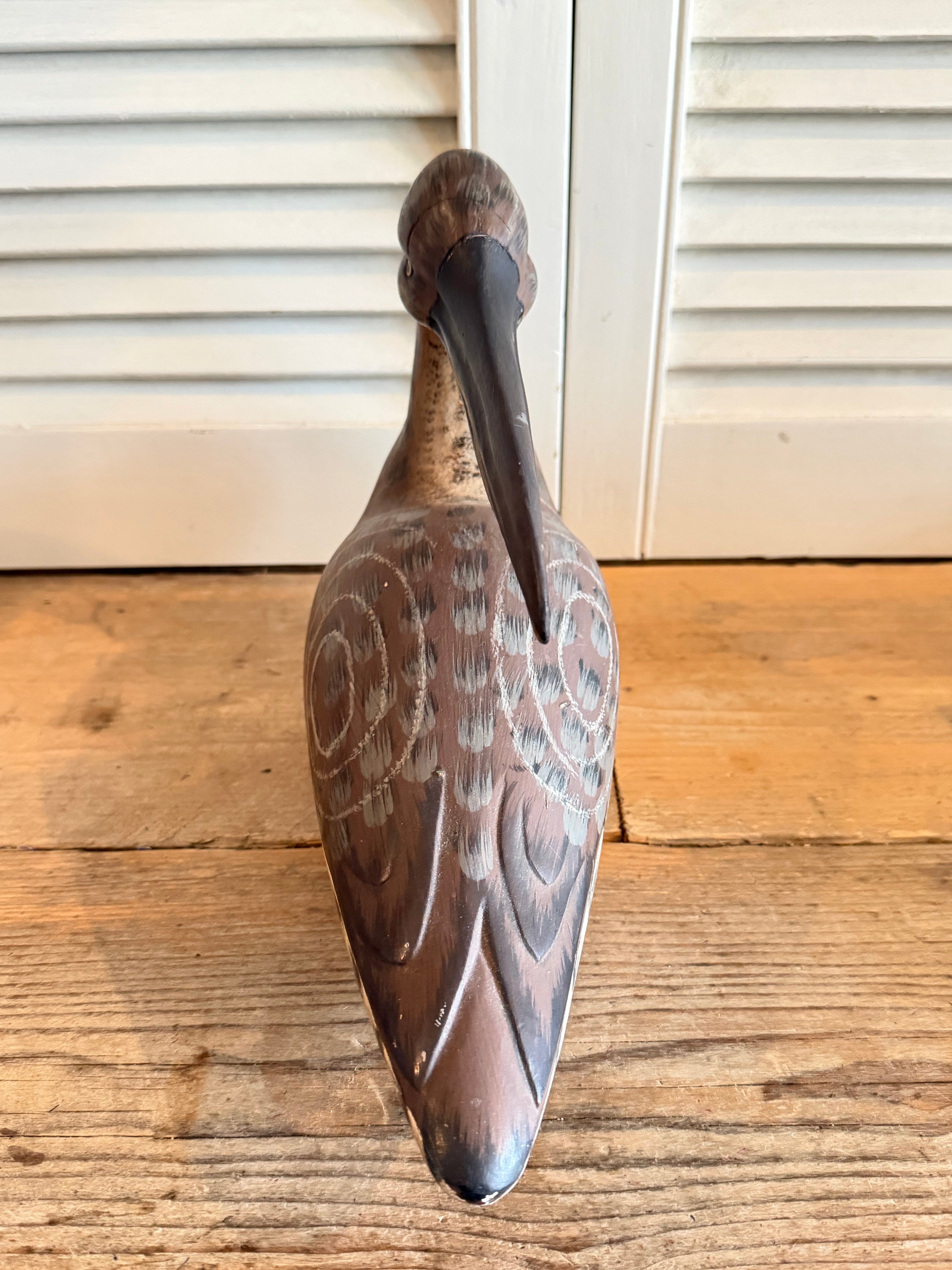Handbeschilderde houten wulp - decoratieve lokvogel