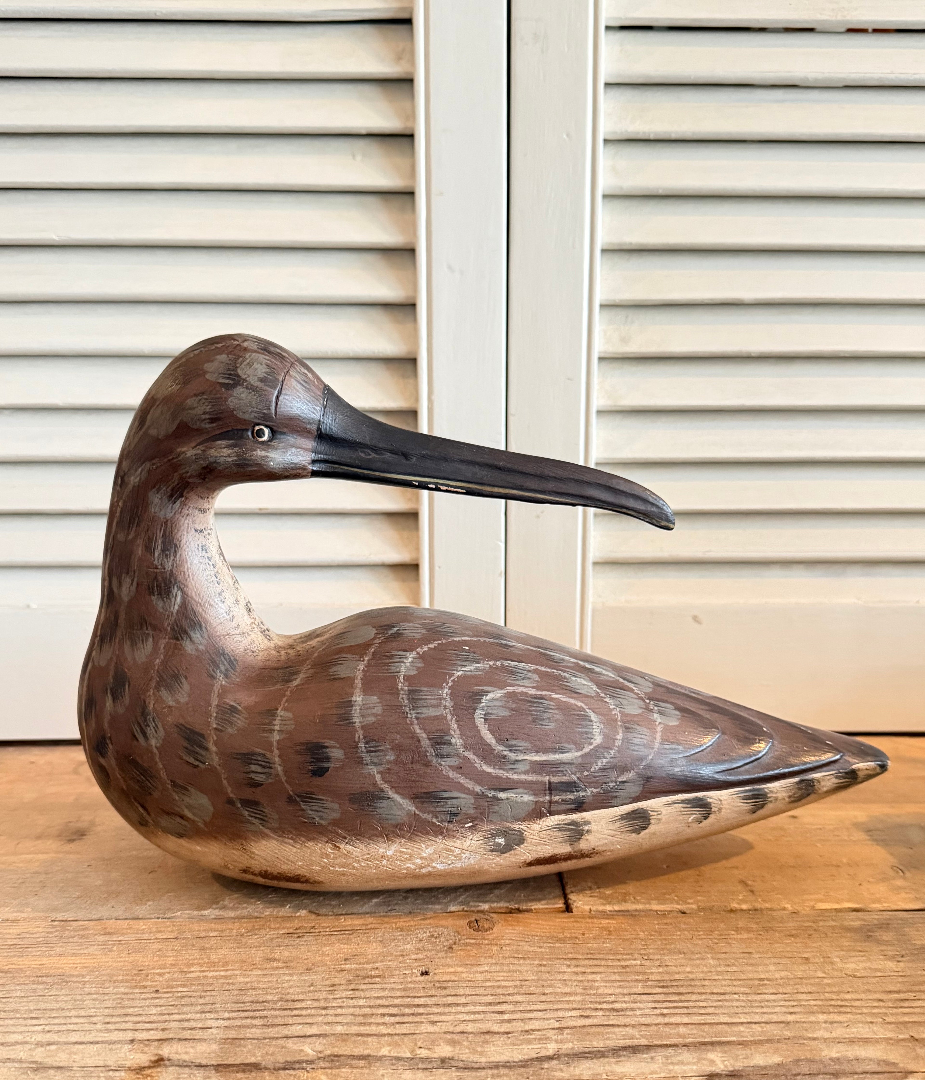 Handbeschilderde houten wulp - decoratieve lokvogel