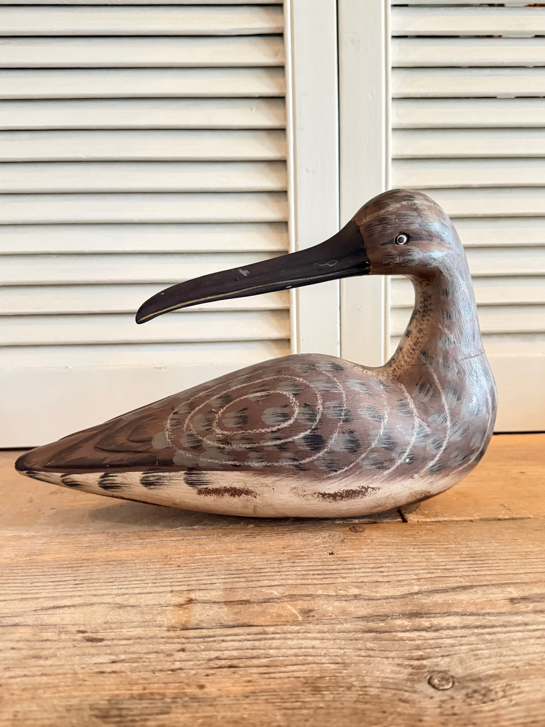 Handbeschilderde houten wulp - decoratieve lokvogel