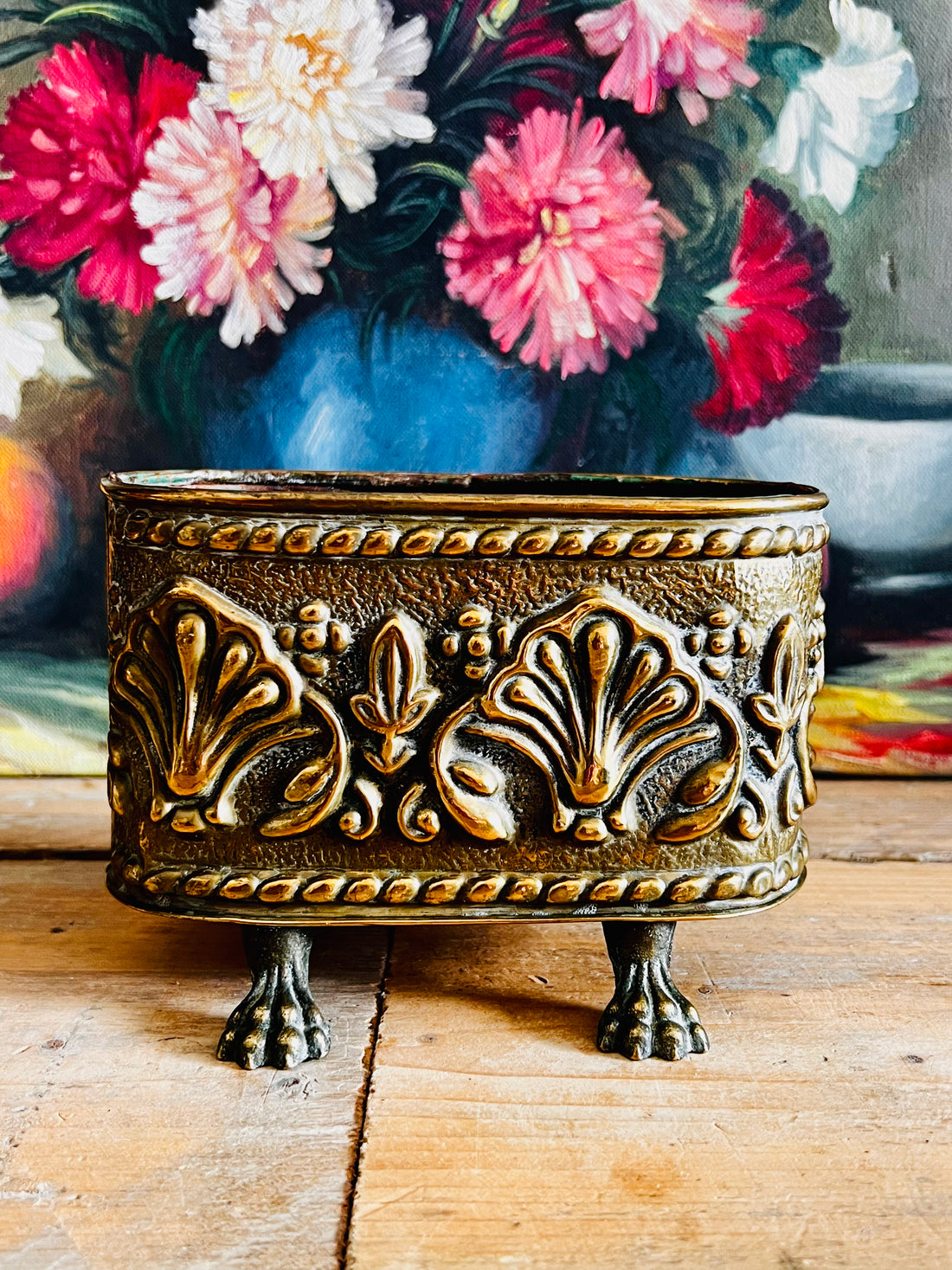 koperen bloempotje, bloempot leeuwenpootjes, vintage plantenpot, koperen plantenpot, retro interieurdecoratie, antieke bloempot, plantenpot koper, unieke plantenhouder, klassieke bloempot