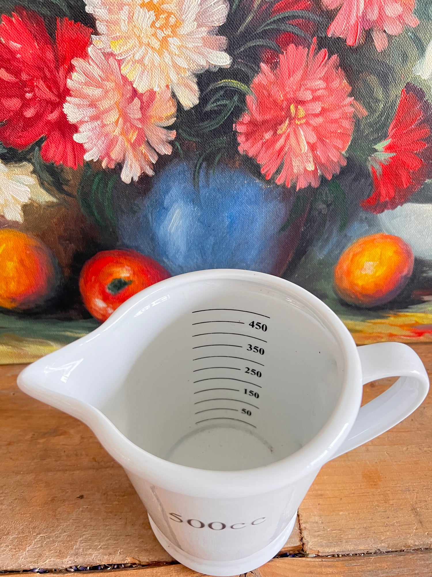 maatbeker pint porselein, witte maatbeker porselein, porseleinen maatbeker, maatbeker 500 ml, stijlvolle maatbeker, keukenmaatbeker porselein, keukenaccessoire wit, precisie maatbeker porselein.