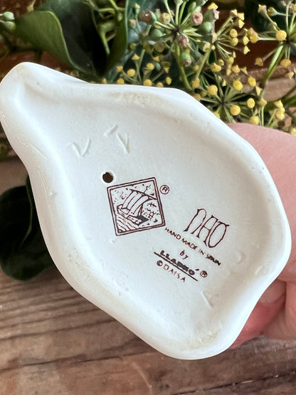 Lladró biddende engel, vintage Lladró beeldje, porseleinen engel beeldje, biddende engel porselein, spirituele decoratie, Lladró vintage kopen, porseleinen beeldje, engel decoratie, religieuze geschenken, Lladró collectie.