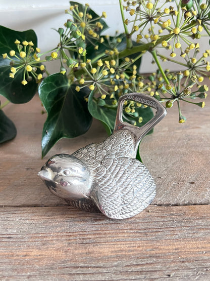 Jam Meuvogel flesopener, zilverkleurige flesopener, vintage flesopener, retro flesopener, metalen flesopener, flesopener vintage stijl, unieke flesopener, Jam Meuvogel opener.