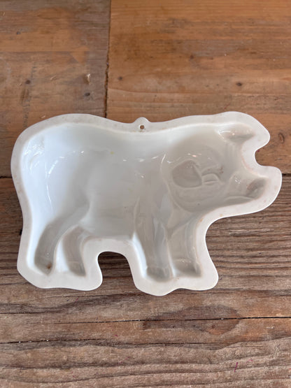 kleine puddingvorm, puddingvorm varken, wit porselein, puddingvorm keuken, muurdecoratie keuken, keukenaccessoires, cadeau keuken. 