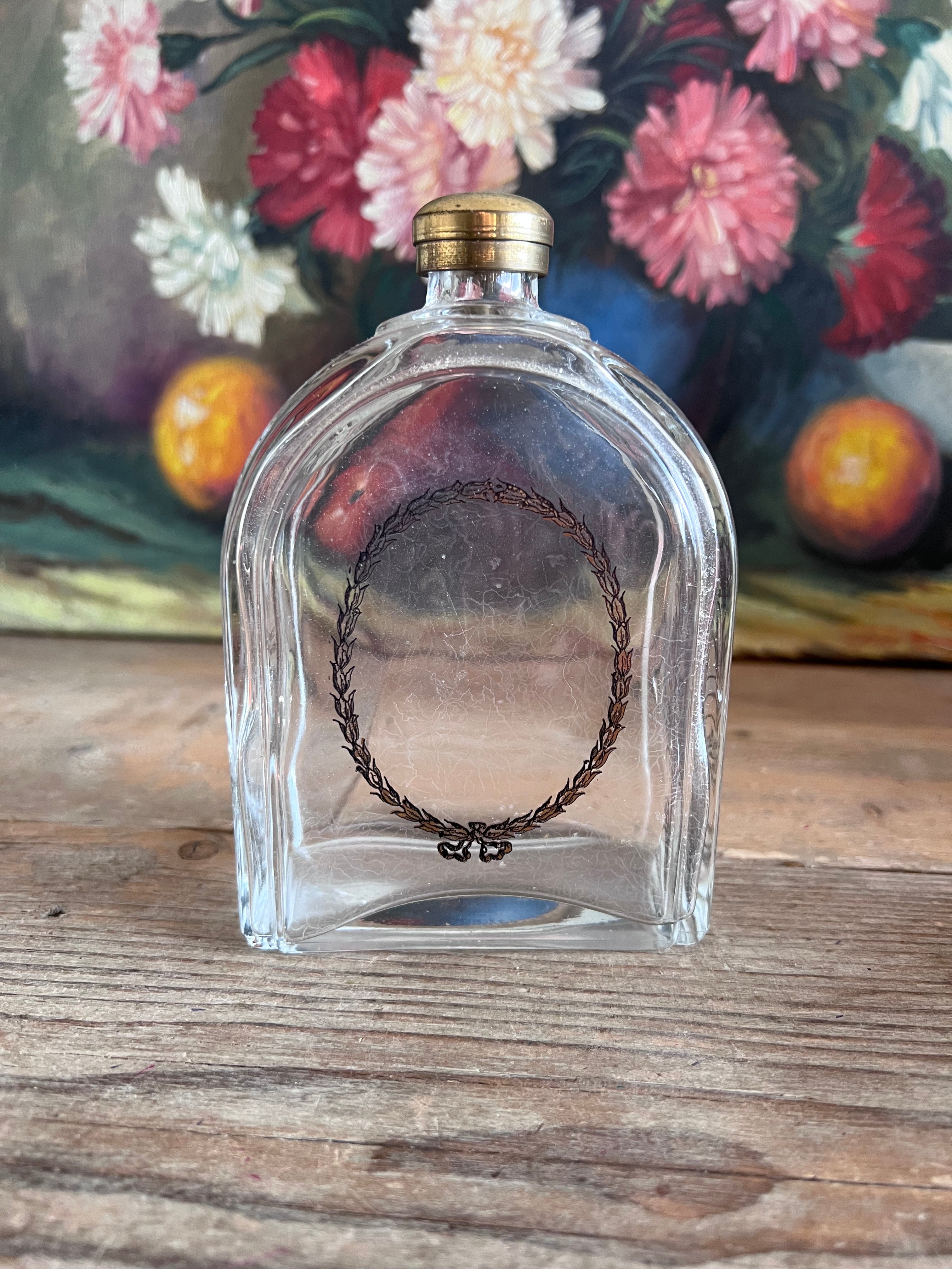 Vintage eau de cologne fles met print en schroefdop