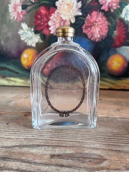 Vintage eau de cologne fles met print en schroefdop