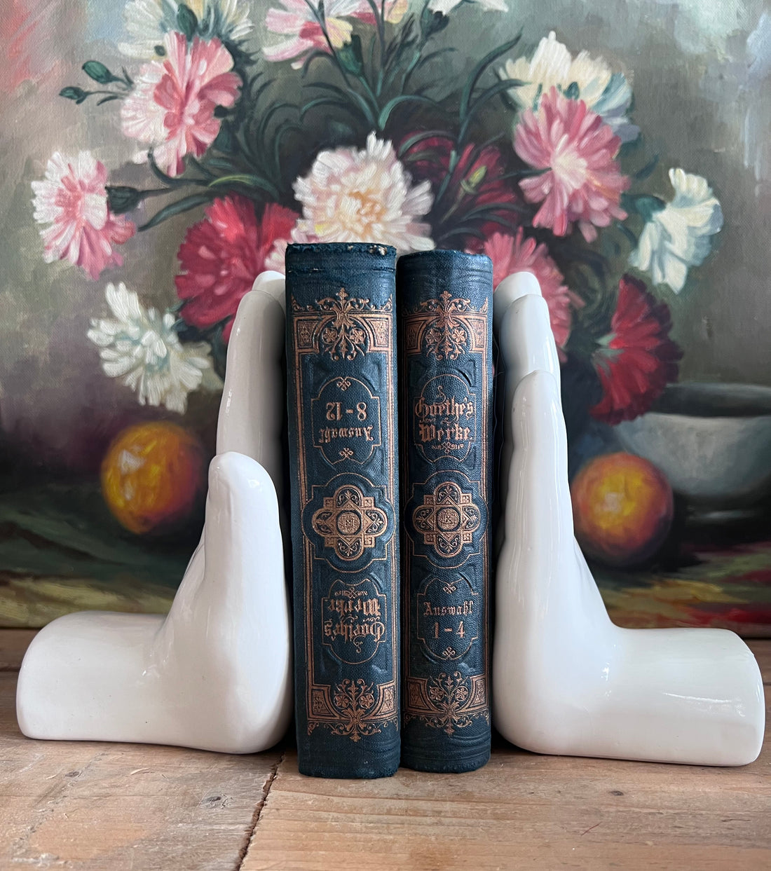 vintage boekensteunen witte handen,boekensteunen, witte boekensteunen