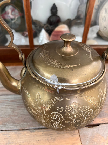 Brass teapot with flowers