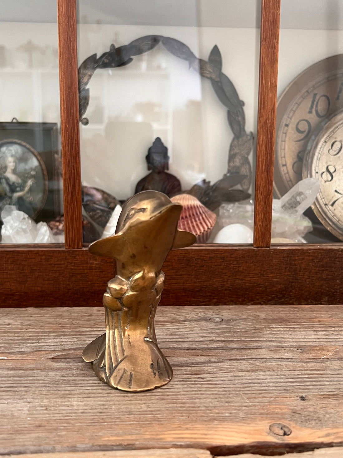 Brass dolphin jumping