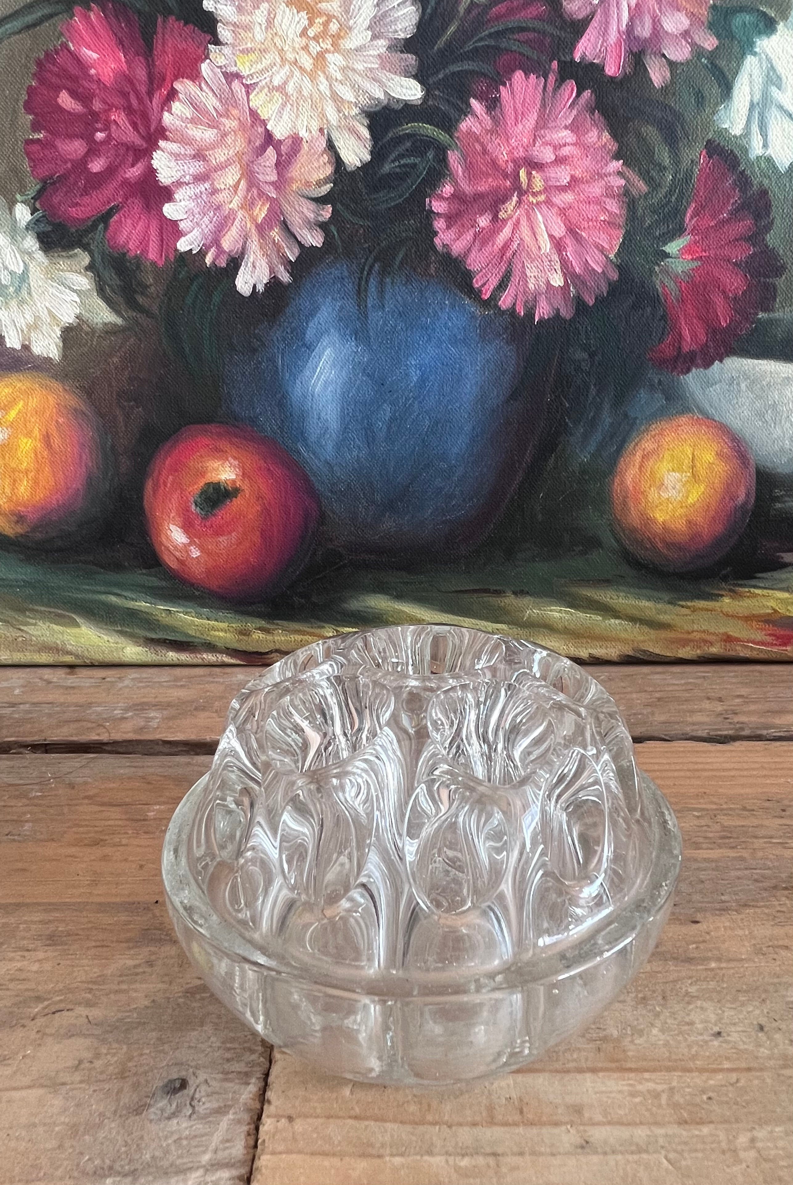 Pique fleurs van glas