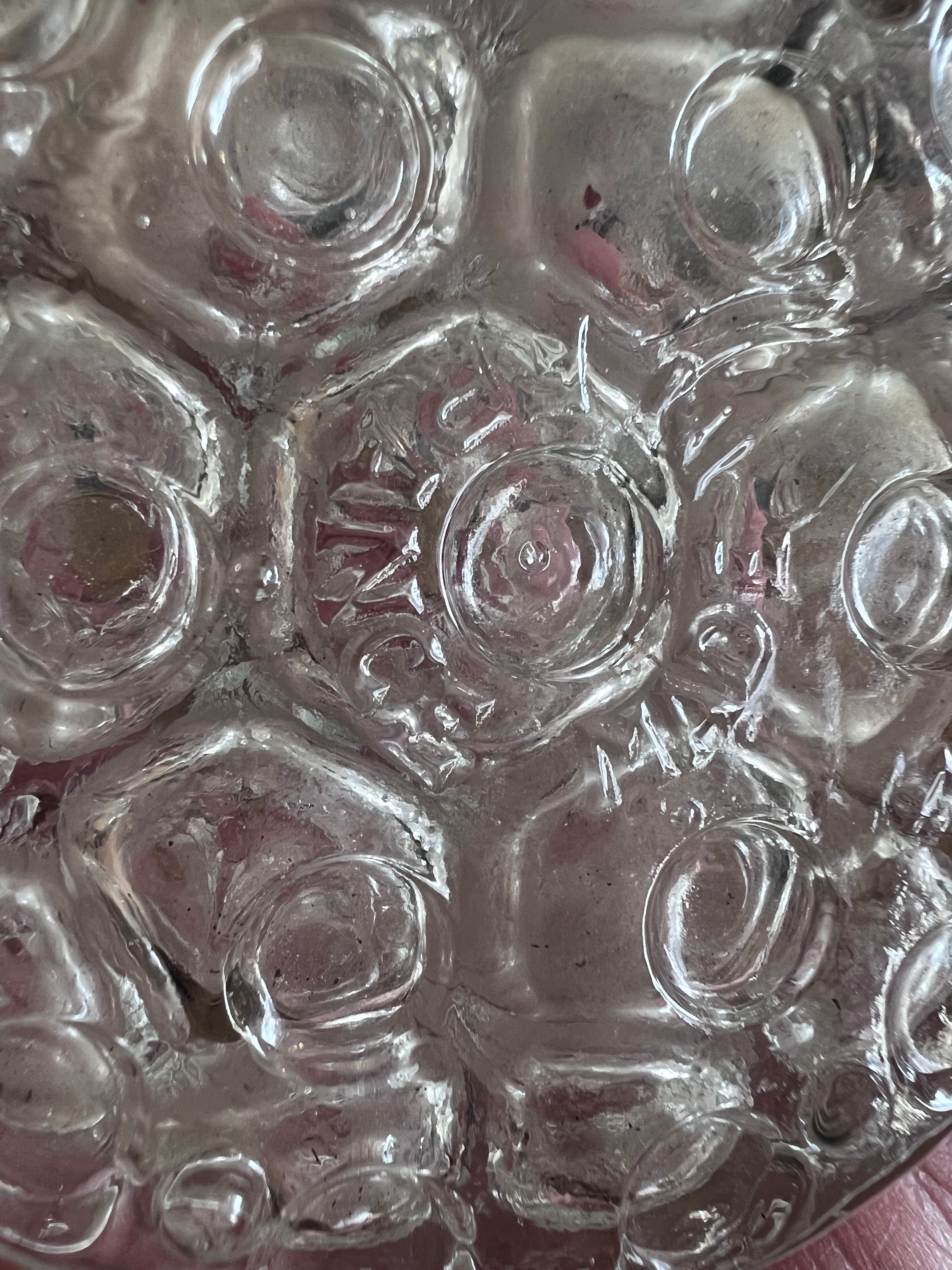 Pique fleurs van glas