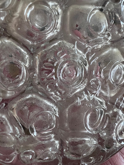 Pique fleurs van glas