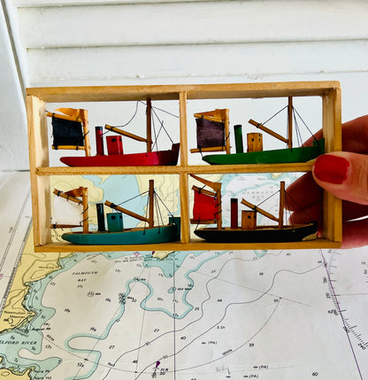 Klein houten frame met Bretonse bootjes