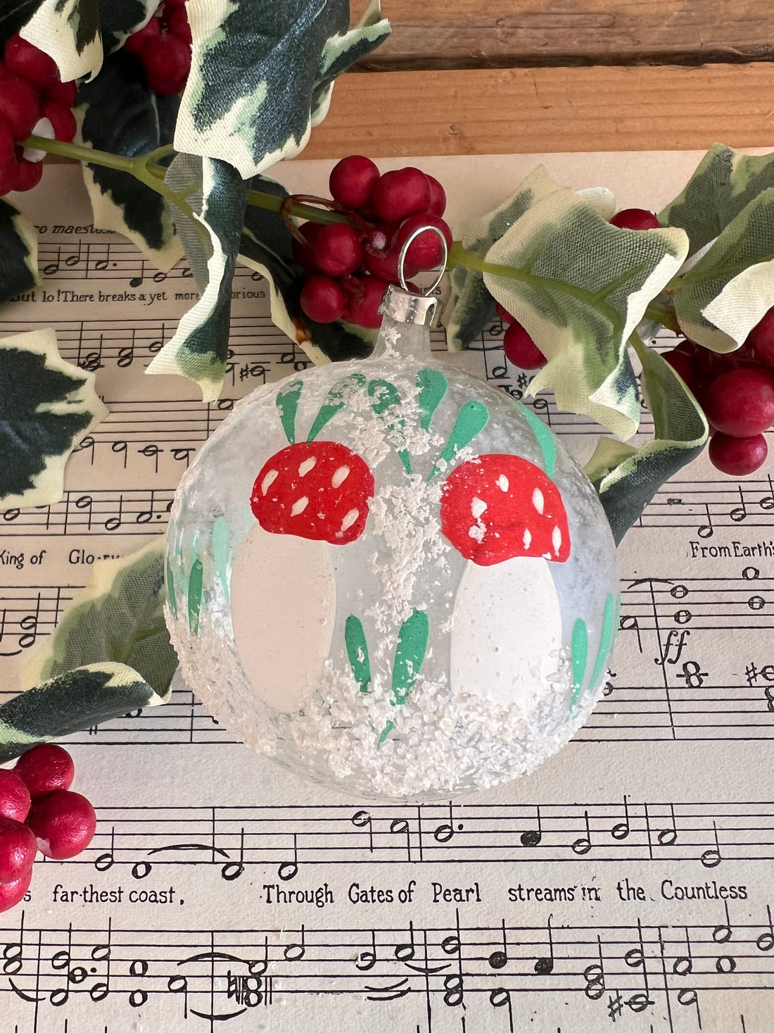 Christmas ball with hand-painted mushrooms