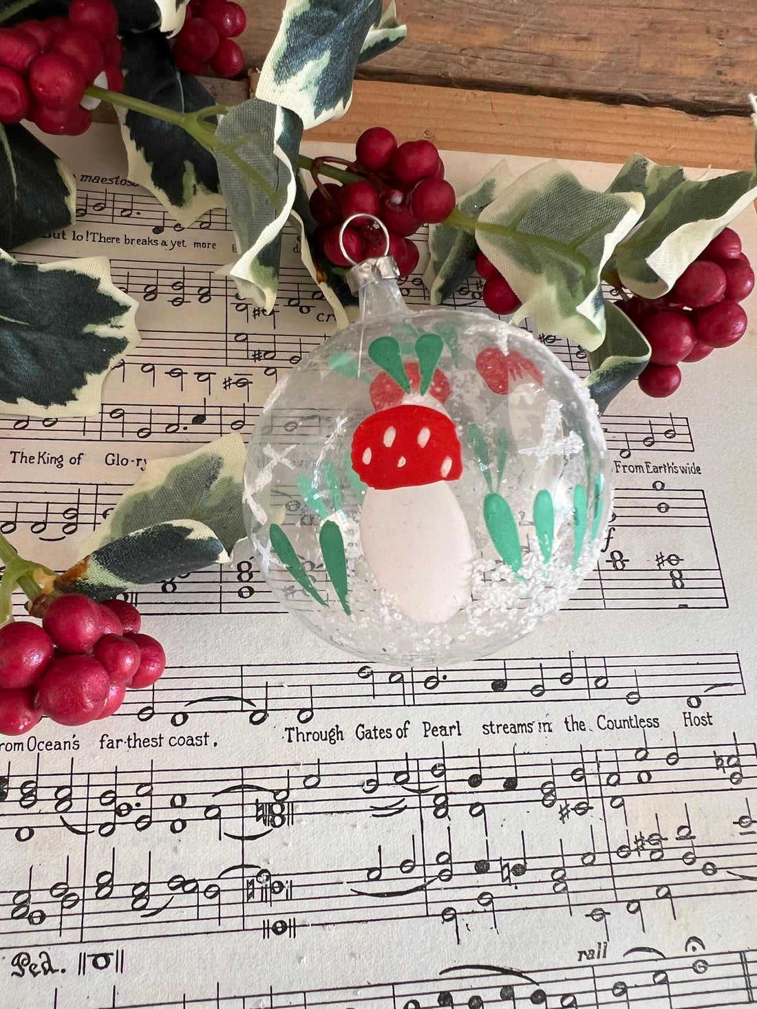 Christmas ball with hand-painted mushrooms